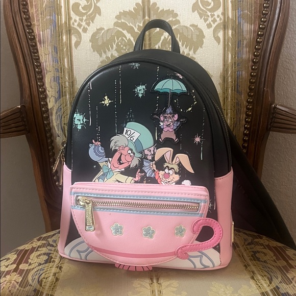 Loungefly Handbags - Alice in Wonderland Loungefly Backpack Mad Tea Party